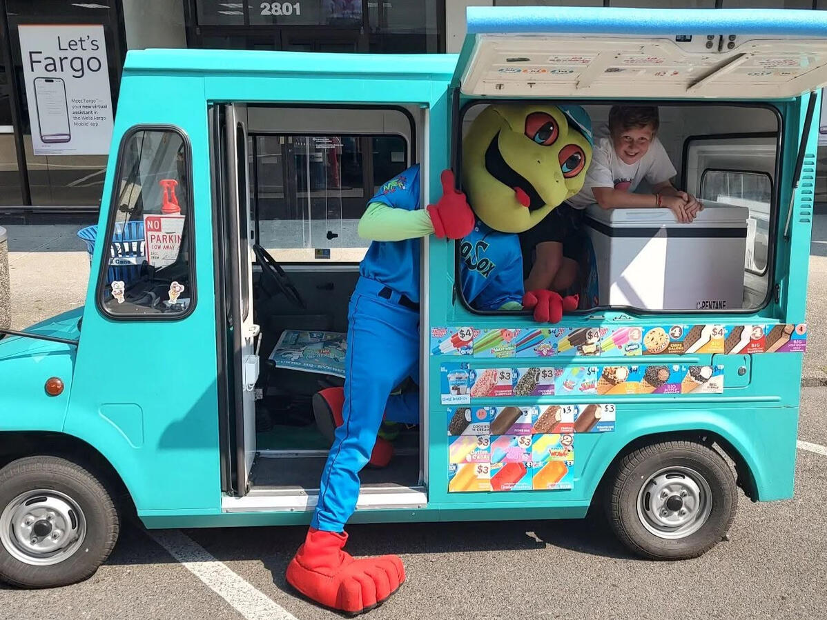 Inky, out with Webbly from the Everett AquaSox Inky, the teal Yay Big micro ice cream truck, serving alongside Webbly the Everett AquaSox mascot at an event in Everett, WA